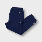 Ralph Lauren navy blue sweatpants featuring green embroidered pony logo and zip pocket