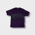 Mecca T-Shirt in purple featuring a large black logo printed across the chest
