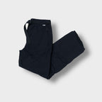 Black Nike 2in1 trackpants with integrated waist belt and small swoosh tab