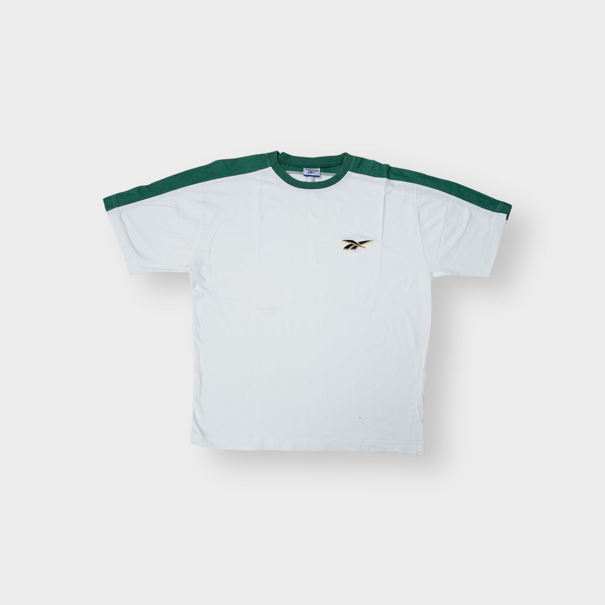 Reebok T-Shirt in white with green shoulder panels and small embroidered chest logo