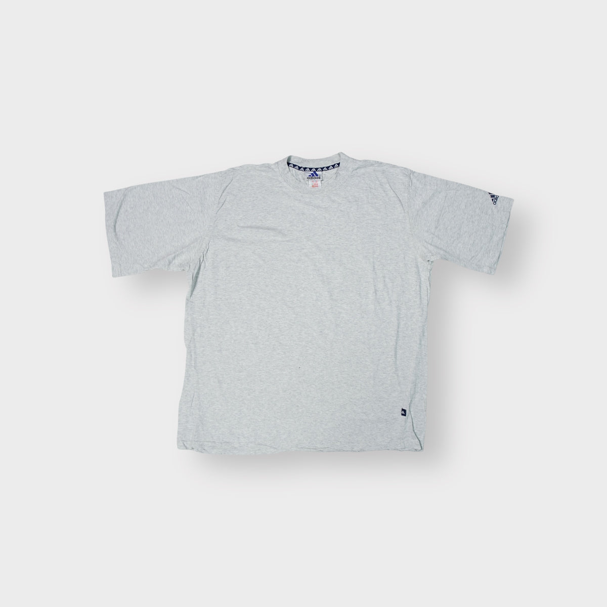 Adidas T-Shirt in heather grey with a navy logo print on the sleeve hem