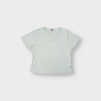 Vintage Adidas beige V-neck shirt featuring a small embroidered chest logo