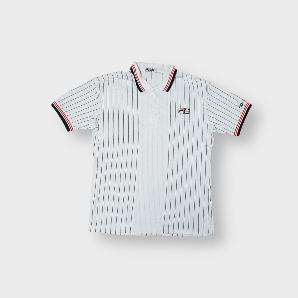 White Fila pinstripe polo shirt with navy and red striped collar trim and chest logo