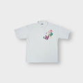 Bonnetti polo shirt in white with colorful abstract graphic print on the left chest