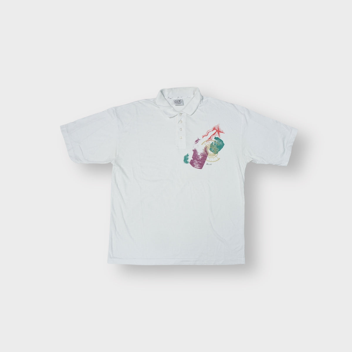 Bonnetti polo shirt in white with colorful abstract graphic print on the left chest