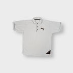 Beige Puma polo shirt in plush nici material featuring an embroidered cat logo on chest