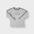 Beige Puma long-sleeve sweater featuring dark trim and printed chest logo