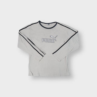 Beige Puma long-sleeve sweater featuring dark trim and printed chest logo