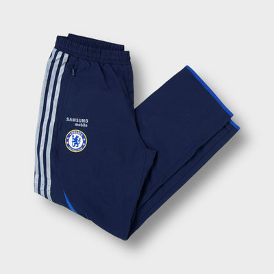 Adidas FC Chelsea navy blue trackpants featuring embroidered club crest and three stripes