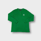Adidas long sleeve henley sweater in green with embroidered white trefoil chest logo.