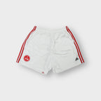 Adidas white shorts with red side stripes and an embroidered 1. FC Nürnberg crest