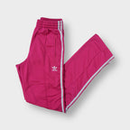 Adidas pink trackpants with white side stripes and embroidered Trefoil logo
