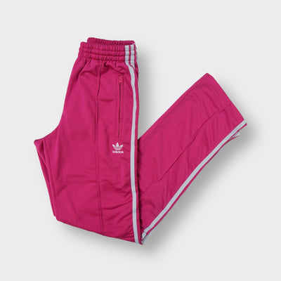 Adidas pink trackpants with white side stripes and embroidered Trefoil logo