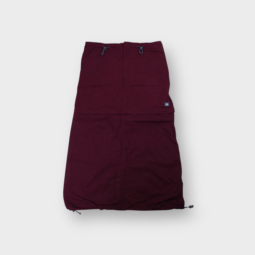 Nike ACG dark red convertible outdoor skirt with waist drawcords and logo patch
