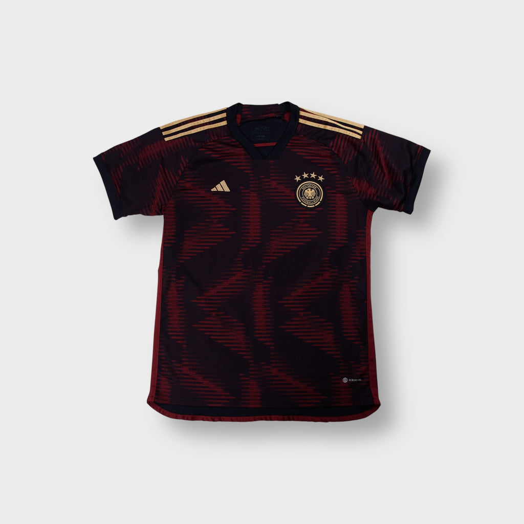 Adidas DFB Germany 2022 black football jersey with gold shoulder stripes and chest crest