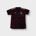 Adidas DFB Germany 2022 black football jersey with gold shoulder stripes and chest crest