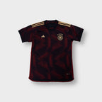 Adidas DFB Germany 2022 black football jersey with gold shoulder stripes and chest crest