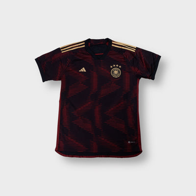 Adidas DFB Germany 2022 black football jersey with gold shoulder stripes and chest crest