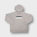 Nike hoodie in beige with an embroidered Swoosh graphic across the chest