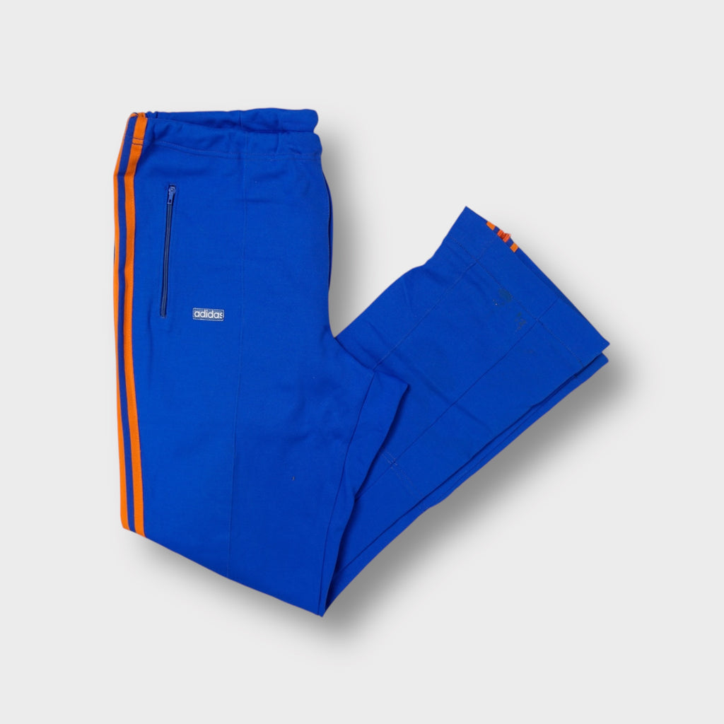 Adidas vintage 70s blue flared trackpants with orange side stripes and small patch logo