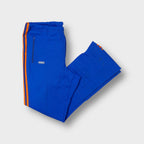 Adidas vintage 70s blue flared trackpants with orange side stripes and small patch logo