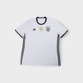 Adidas DFB white football jersey with black collar and central gold FIFA badge.