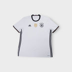 Adidas DFB white football jersey with black collar and central gold FIFA badge.