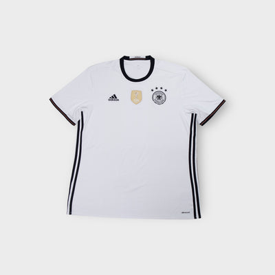 Adidas DFB white football jersey with black collar and central gold FIFA badge.