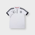 Adidas DFB white polo shirt with black three stripes and official team crest