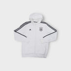 White Adidas zip hoodie featuring the black DFB crest with four stars and shoulder stripes