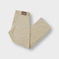Gant beige cotton trousers featuring a leather logo patch on the back waistband