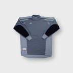 Grey Adidas goalkeeper jersey with black elbow padding and high collar