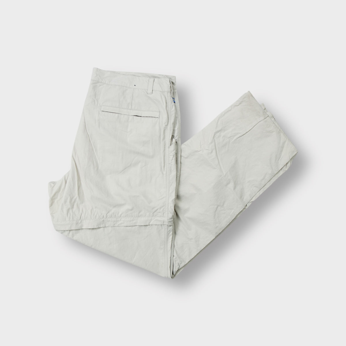 Fjällräven beige convertible trousers with zip-off legs and embroidered fox logo