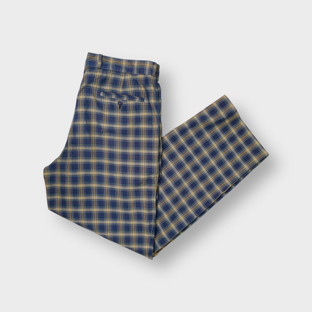 Lacoste trousers in blue check pattern with an embroidered crocodile logo at the waist