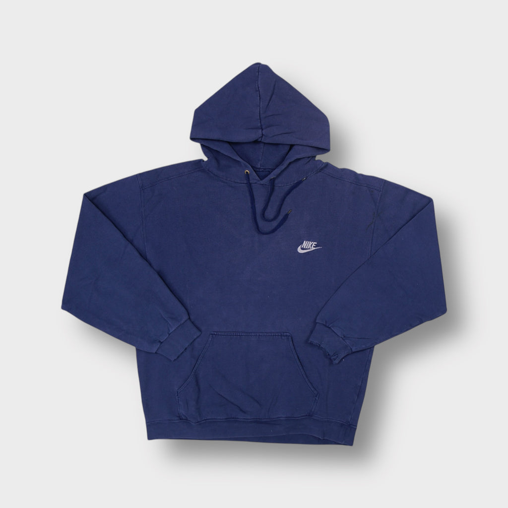 Blue Nike hoodie featuring white embroidered swoosh logo on left chest