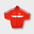 Adidas track jacket in red with Czechoslovakia football crest patch on the chest.