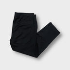 Ralph Lauren suit pants in black featuring a geometric patterned waistband lining.