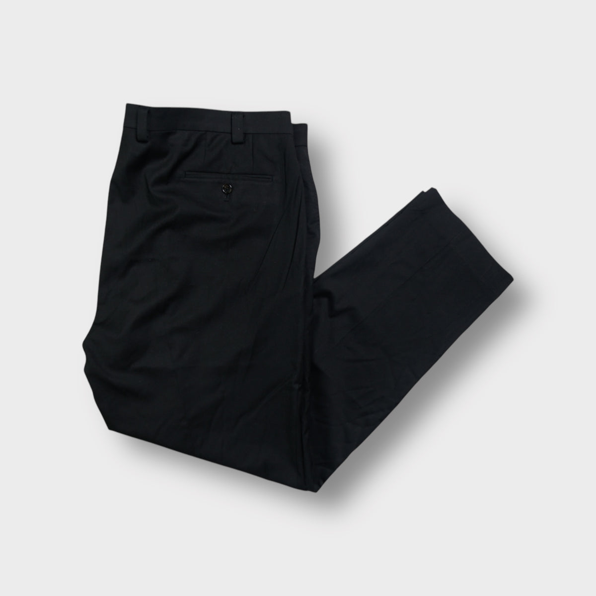 Ralph Lauren suit pants in black featuring a geometric patterned waistband lining.