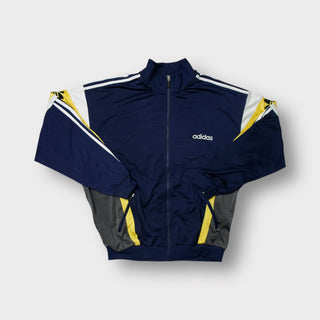 Navy Blue Adidas track jacket showing yellow panel detail and embroidered logo