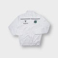 Macron Hannover 96 track jacket in white with green crest and black sponsor print