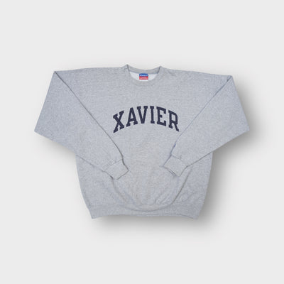 Grey Champion sweater with dark arched Xavier lettering printed on the front
