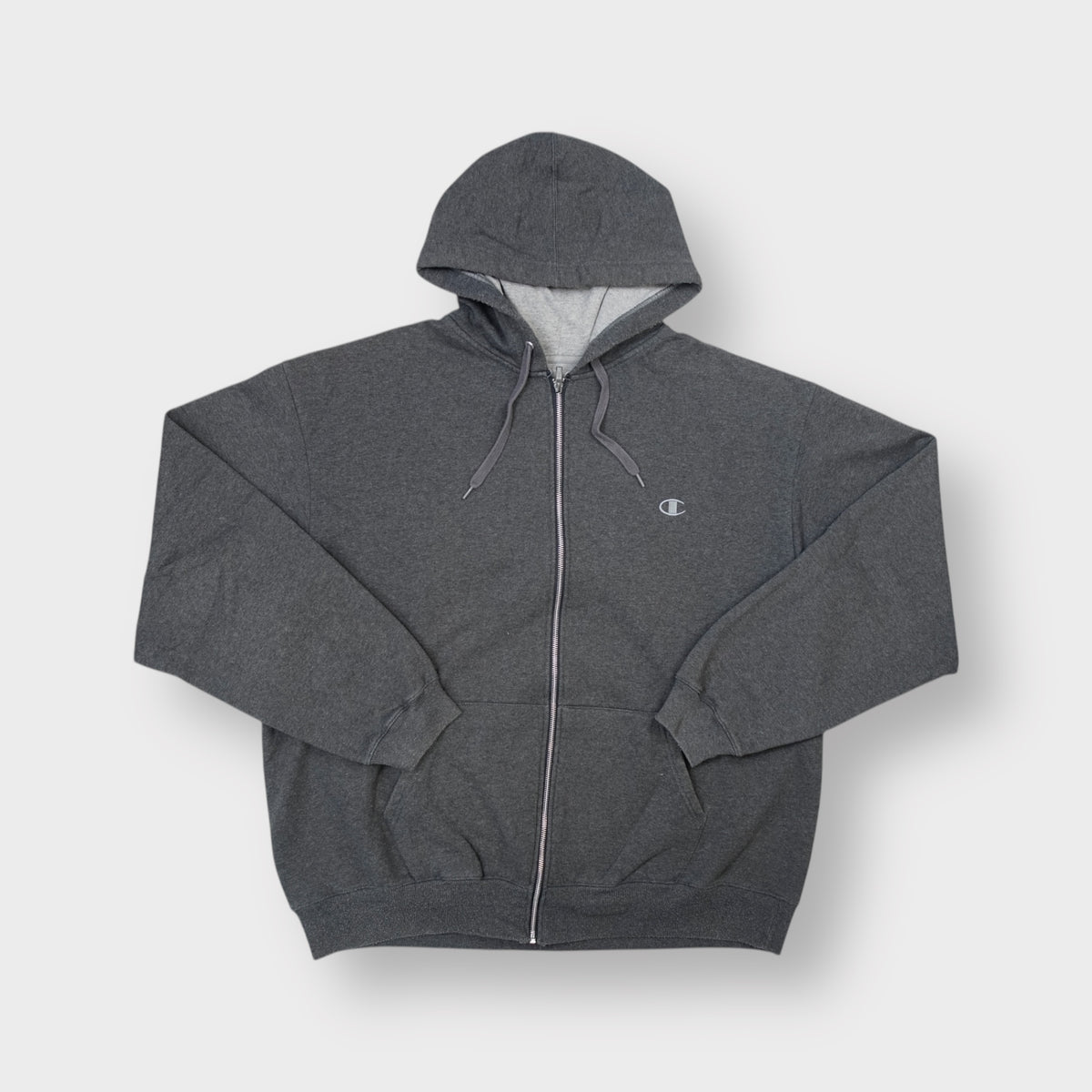 Champion zip hoodie in dark grey with a small embroidered C logo on the chest