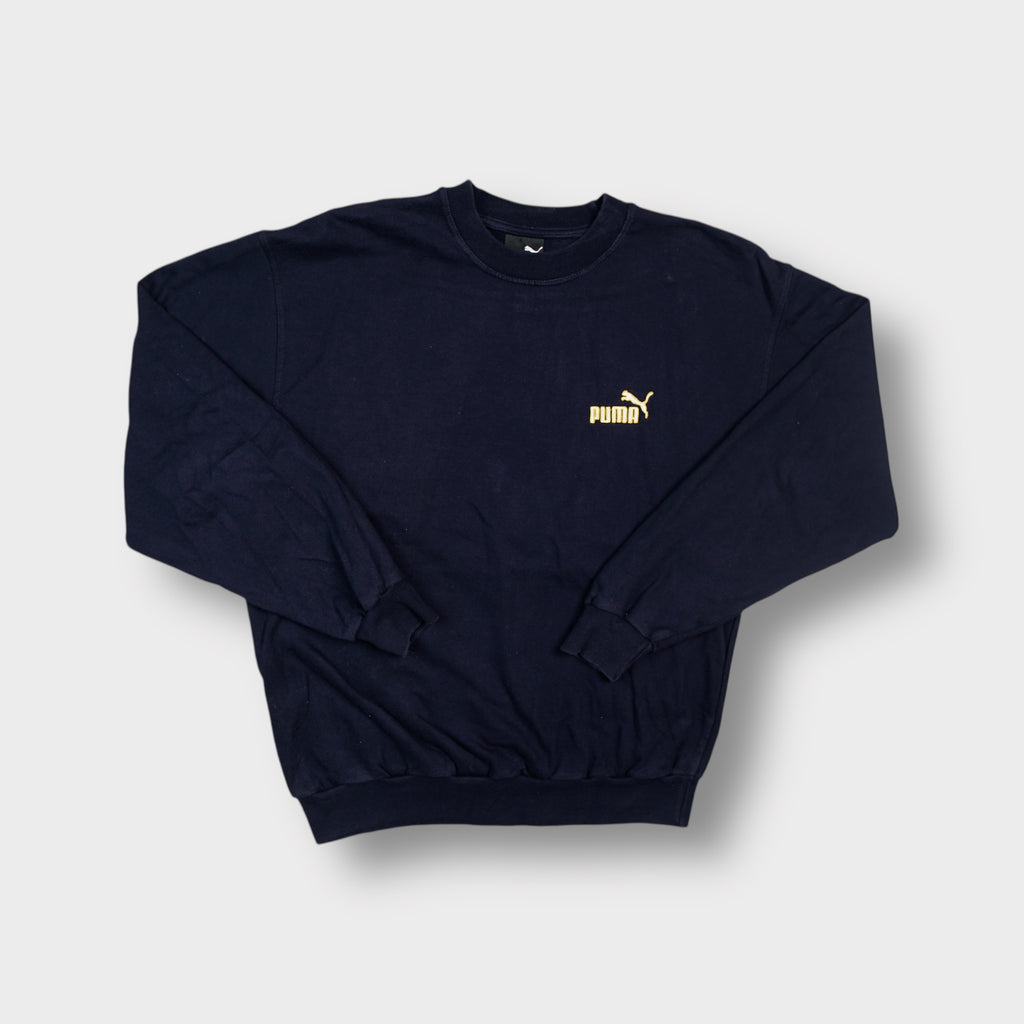 Puma sweater in navy blue with a yellow embroidered logo on the chest