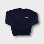 Puma sweater in navy blue with a yellow embroidered logo on the chest