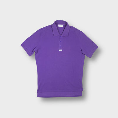 Purple Adidas polo shirt featuring a three-button placket and a small logo tab