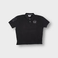 La Martina polo shirt in black featuring an embroidered Tradicion Del Polo Argentino chest logo