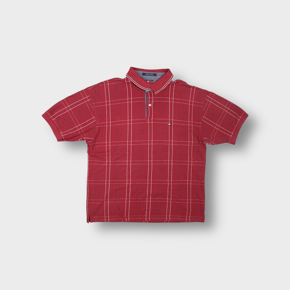 Tommy Hilfiger polo shirt in red check grid pattern with small embroidered chest flag logo