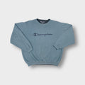 Blue Champion crewneck sweater with embroidered script logo on the chest