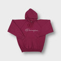 Red Champion hoodie featuring a white printed script logo on the chest