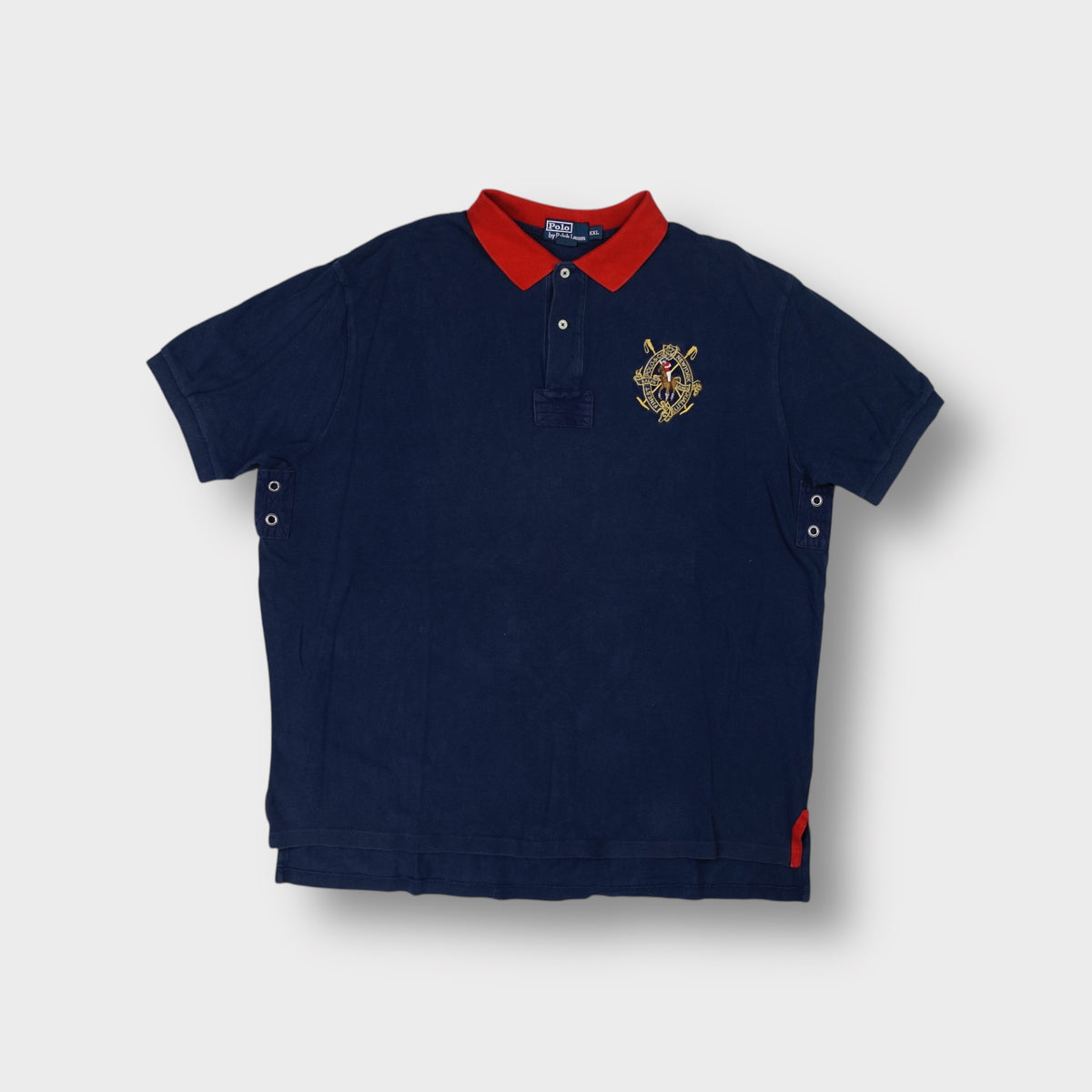 Ralph Lauren short-sleeve polo shirt in blue with a contrast red collar and chest crest embroidery